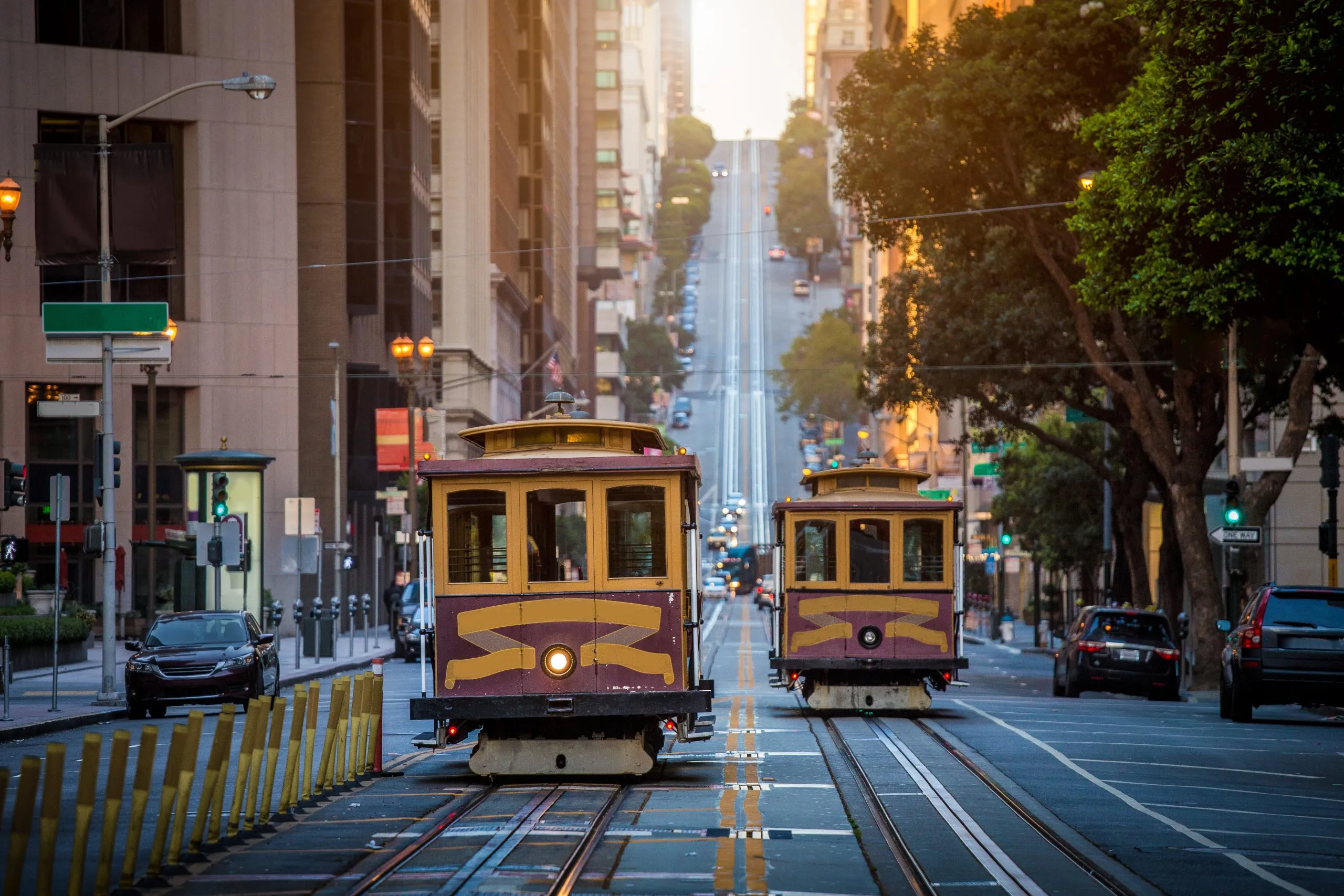 Ride the historic cable cars through cityscapes